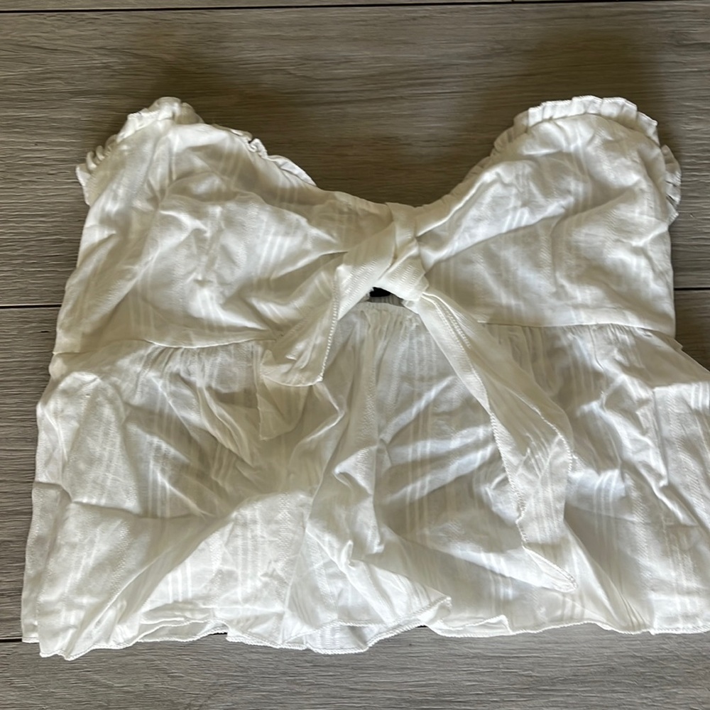 Ruffled tie know crop blouse